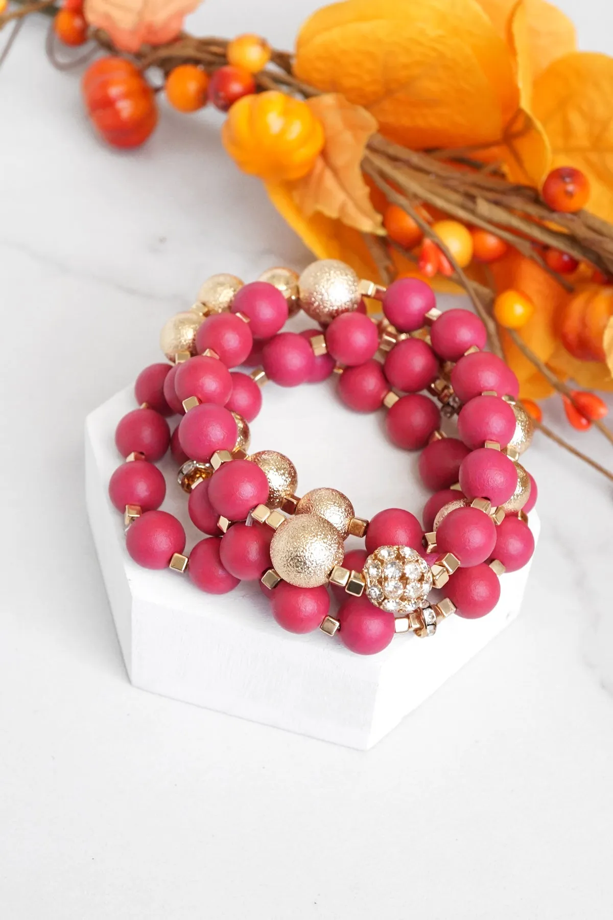 Beaded bracelets set in Red and Gold with clear crystals