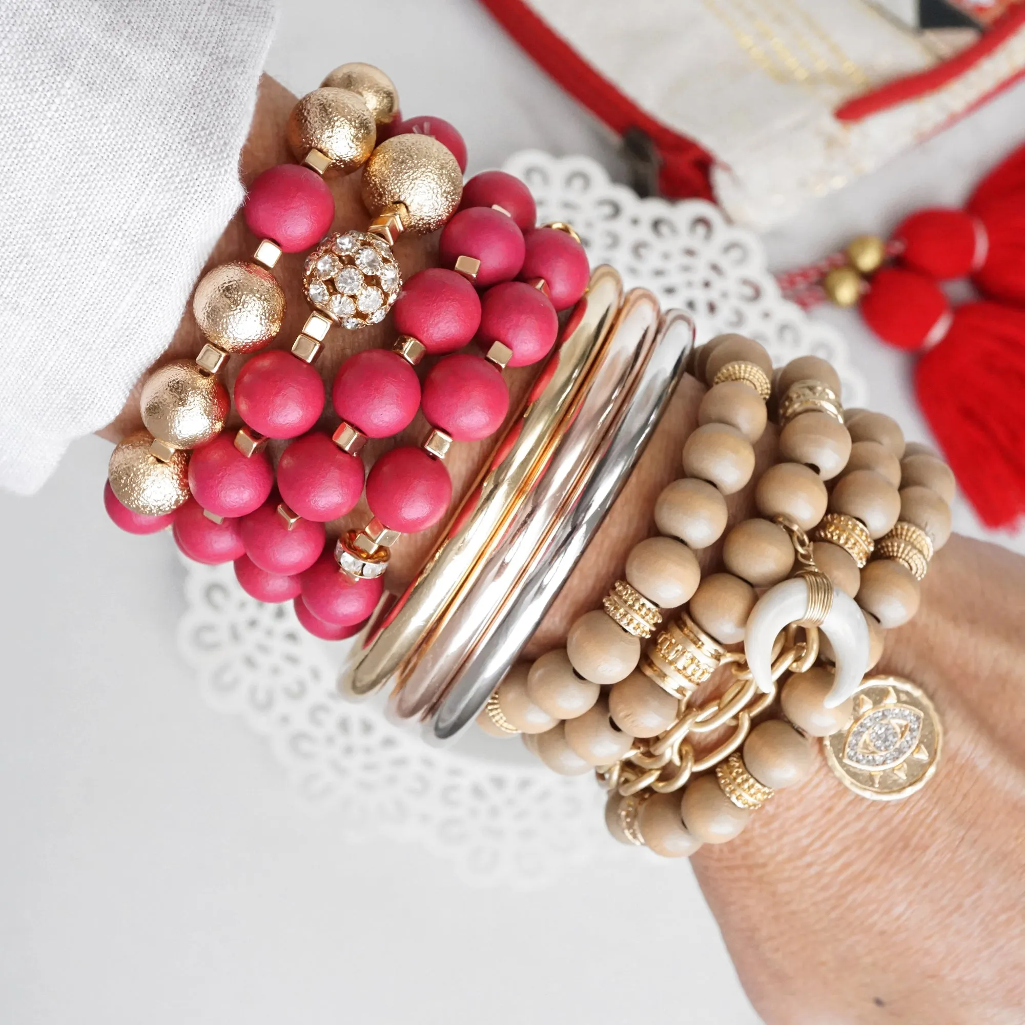 Beaded bracelets set in Red and Gold with clear crystals